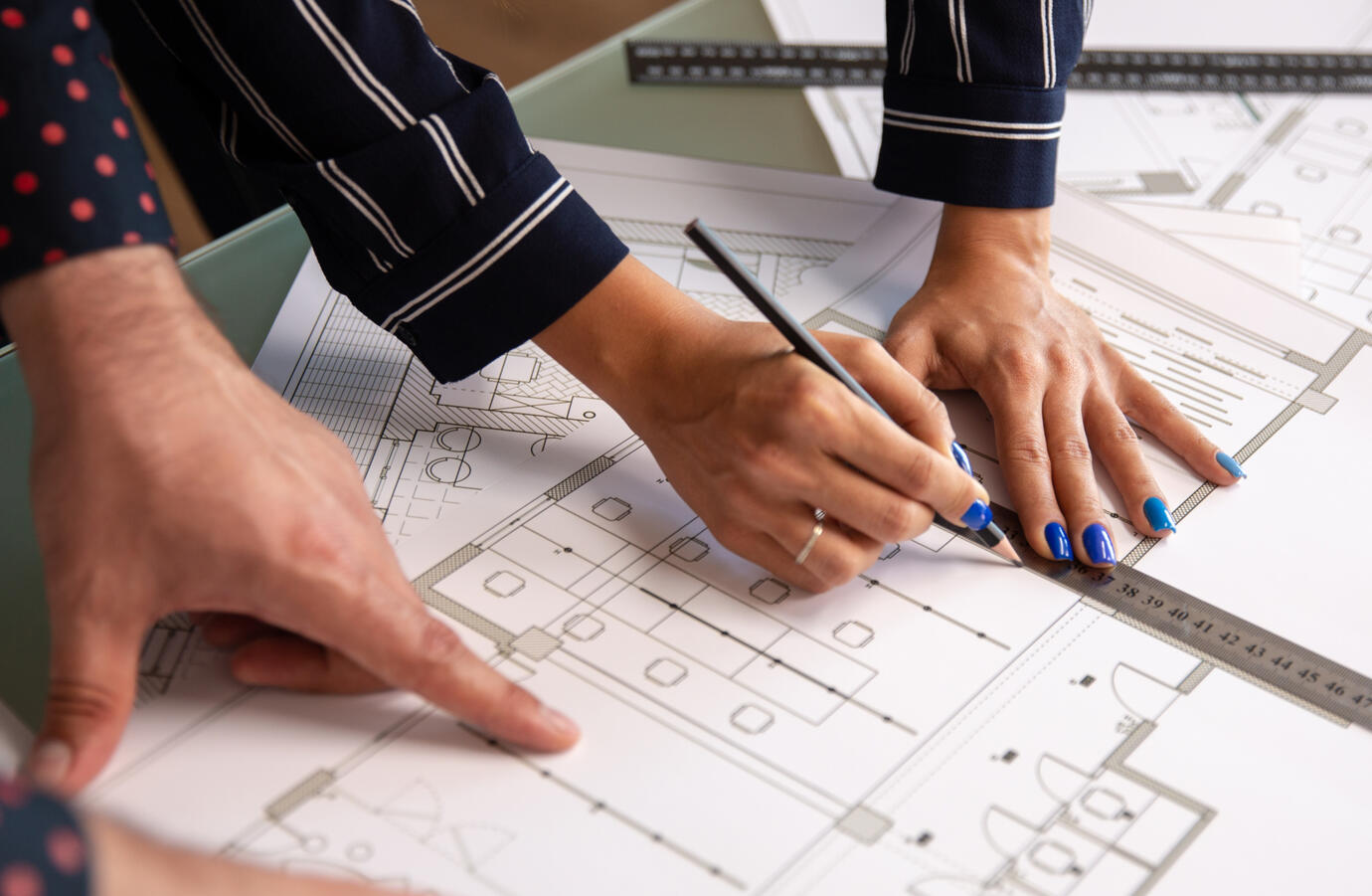 Architectural drawings on desk